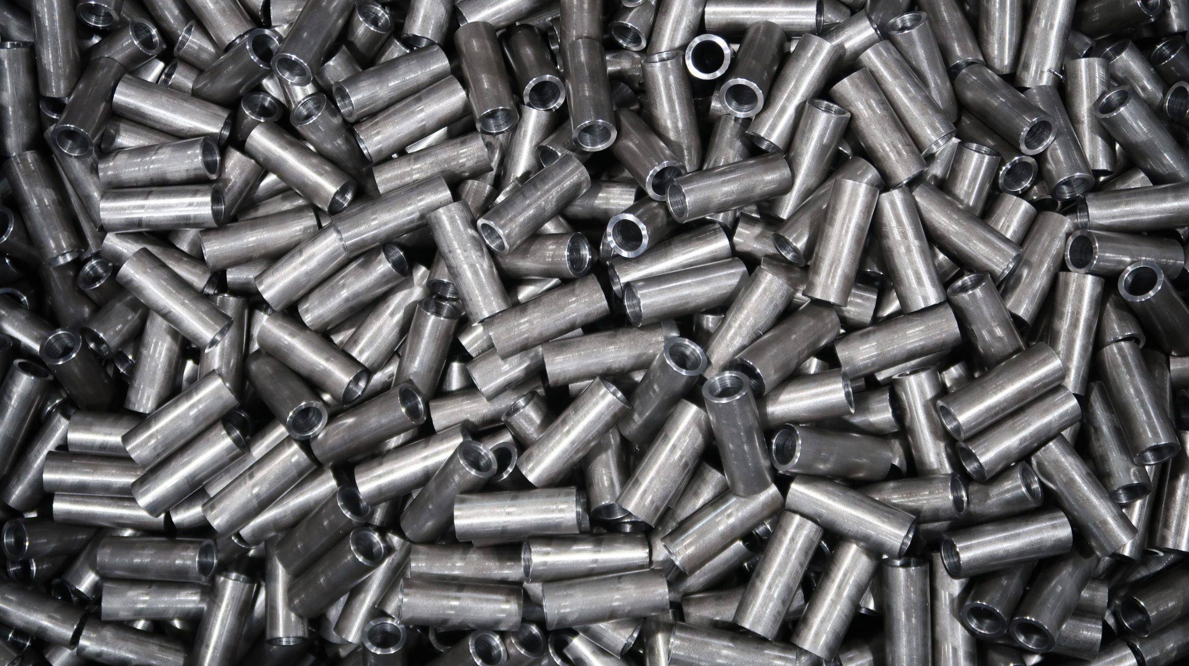 Several spacer parts in a bin.